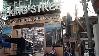 Tourists Enjoy A Stroll On Pattaya'S Famous Pedestrian Street